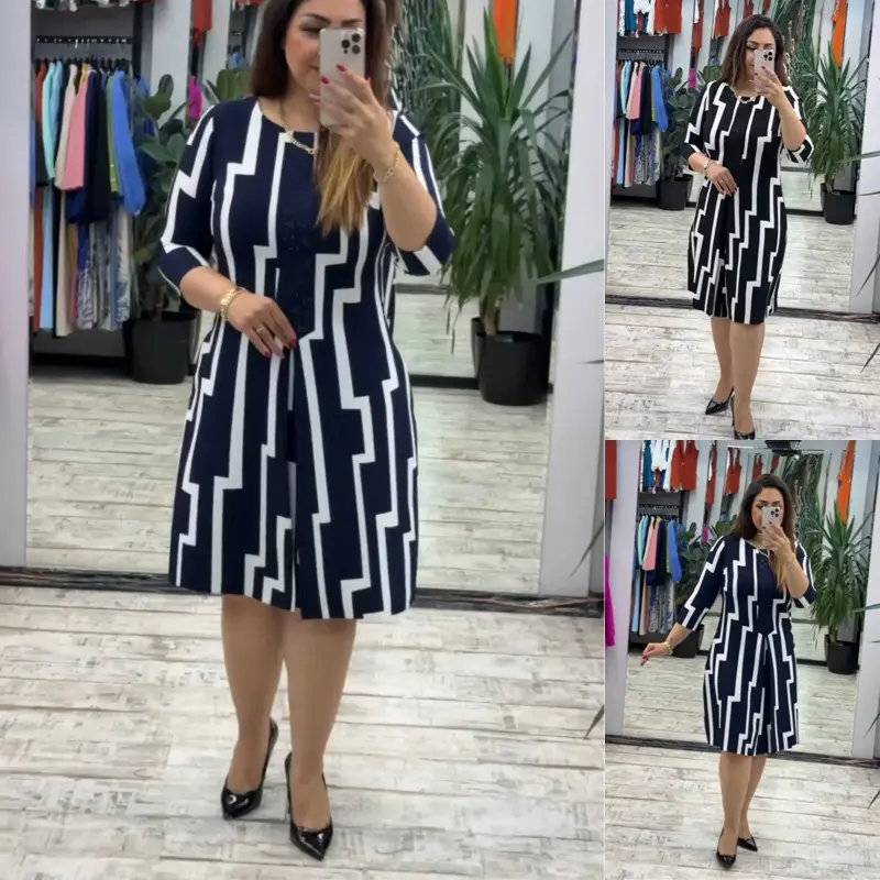 Elegantiška moteriška suknelė su geometriniu raštu