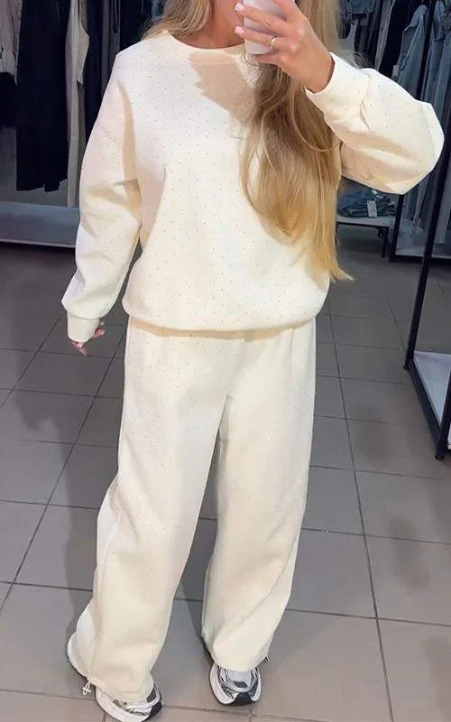 Moteriškas treningas su blizgučiais