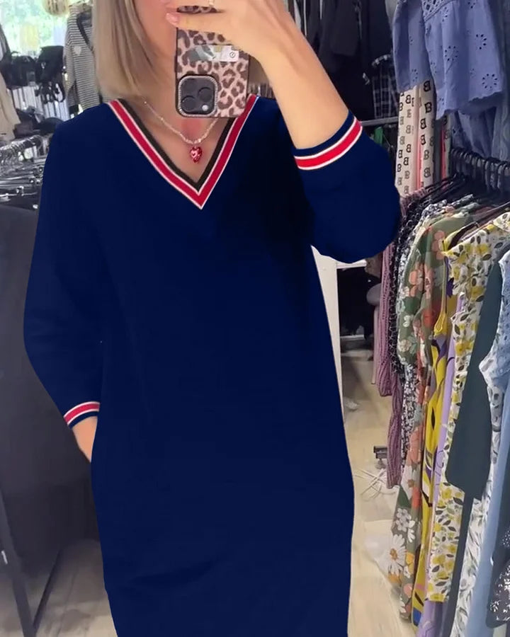 Suknelė su V formos iškirpte