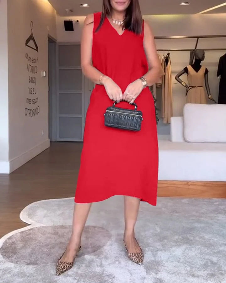 Elegantiška suknelė su skeltuku