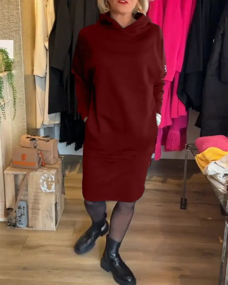 Džemperio tipo suknelė su kapišonu ir kišenėmis