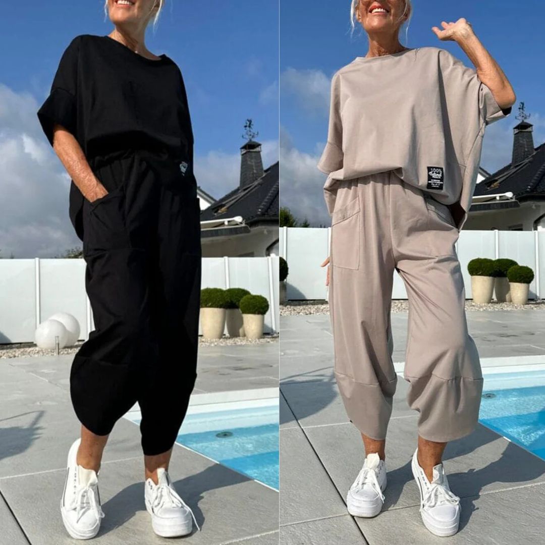 Moteriškas laisvalaikio kostiumas su apvalia iškirpte ir kelnėmis