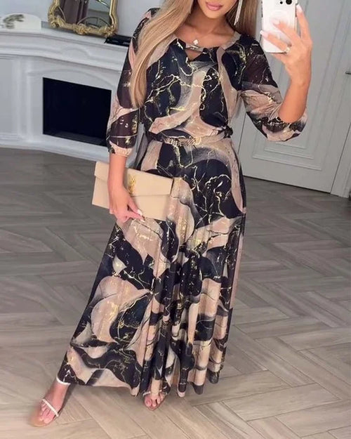 Elegantiška suknelė su trijų ketvirčių rankovėmis