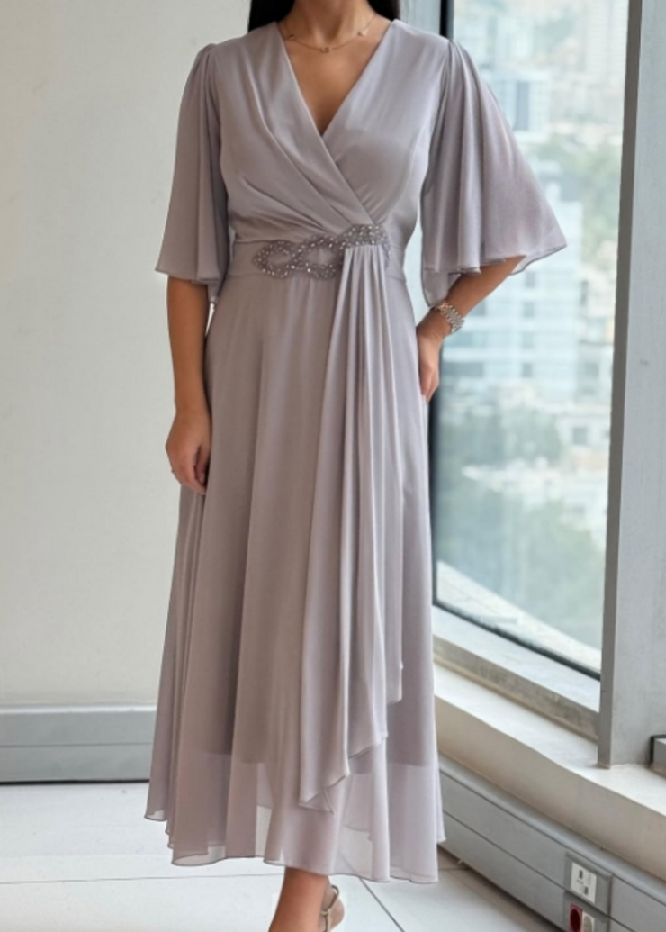 Elegantiška ilga suknelė progoms