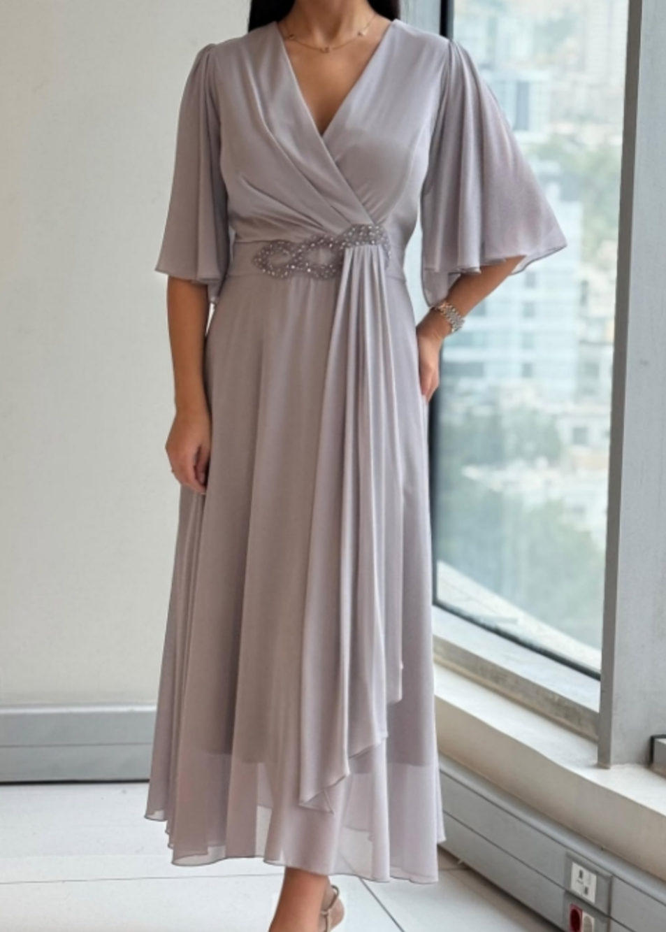 Elegantiška ilga suknelė progoms