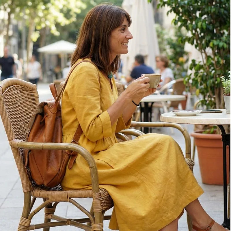 Moteriška laisvalaikio suknelė su V formos iškirpte ir 3/4 rankovėmis bei kišenėmis