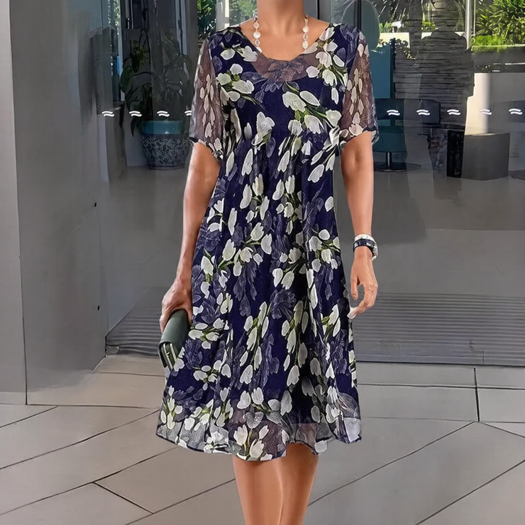 Elegantiška moteriška šifoninė suknelė su gėlių raštu
