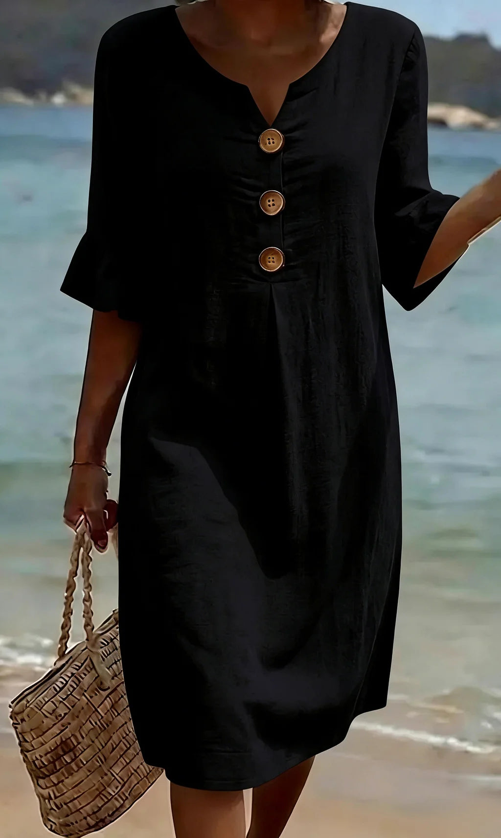 Moteriška suknelė su pūstomis rankovėmis ir sagomis