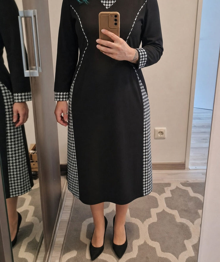 Juoda liekninanti suknelė